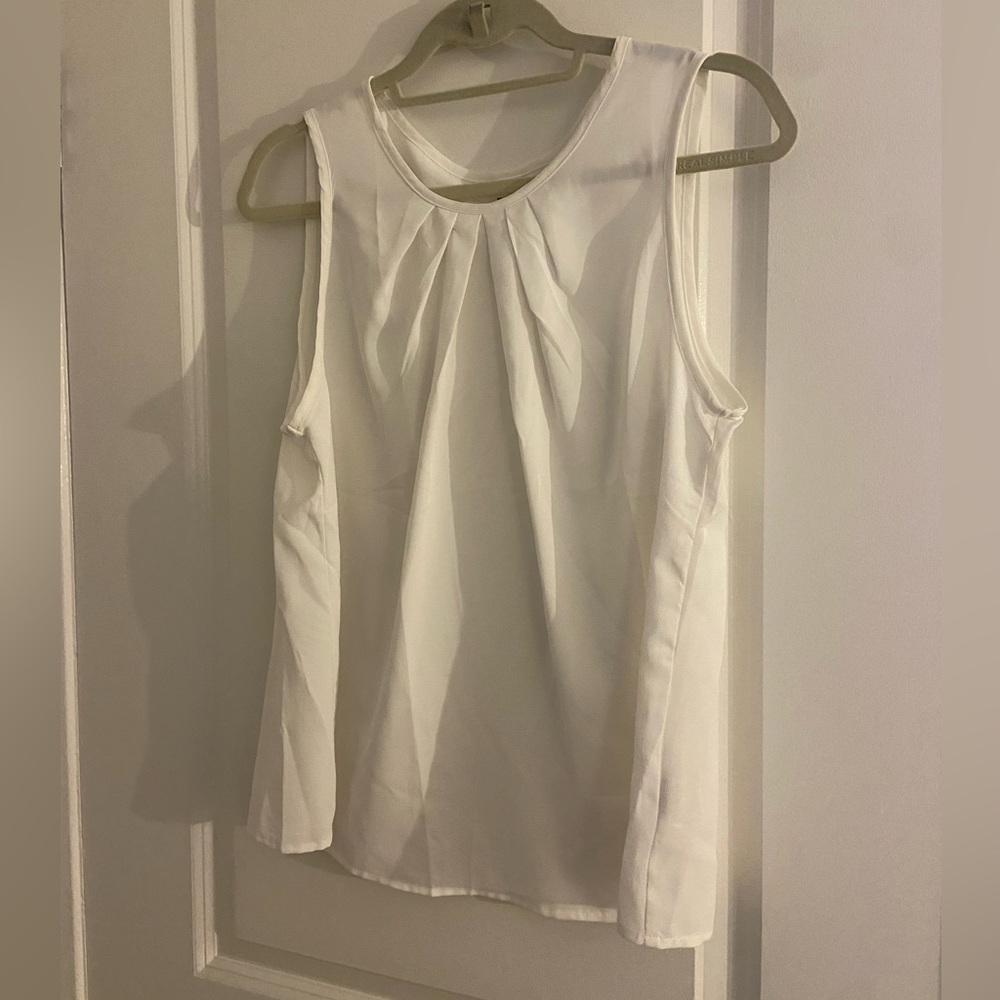 White tank top blouse. Never worn, good for work.